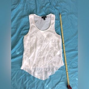 A. Byer off white sleeveless sheer flowy blouse